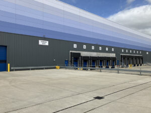 The outside of a huge, modern 3PL warehousing facility.